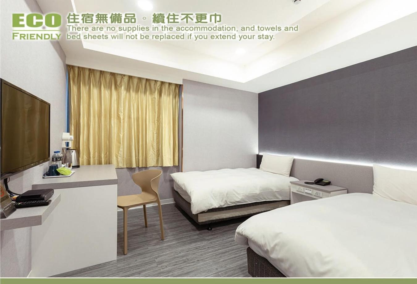 Kiwi Express Hotel - Zhongqing Taichung Habitación foto